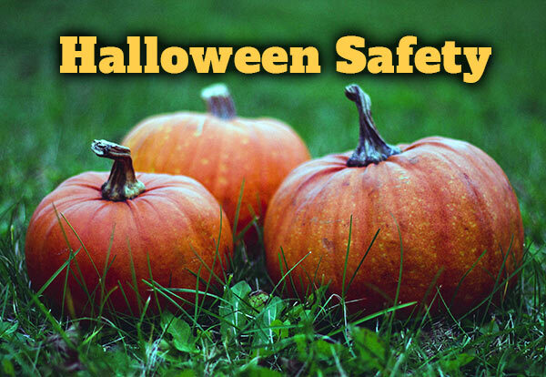 Three pumpkins and the text, Halloween Safety.